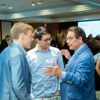 Jim Brooks talking to students at Scholarship Dinner 2019